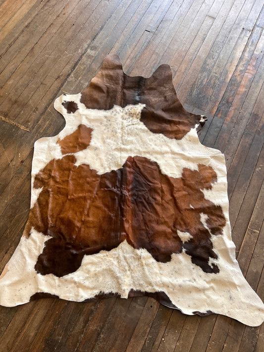 Cowhide Rug - 6.5 ft by 4.5 ft.
