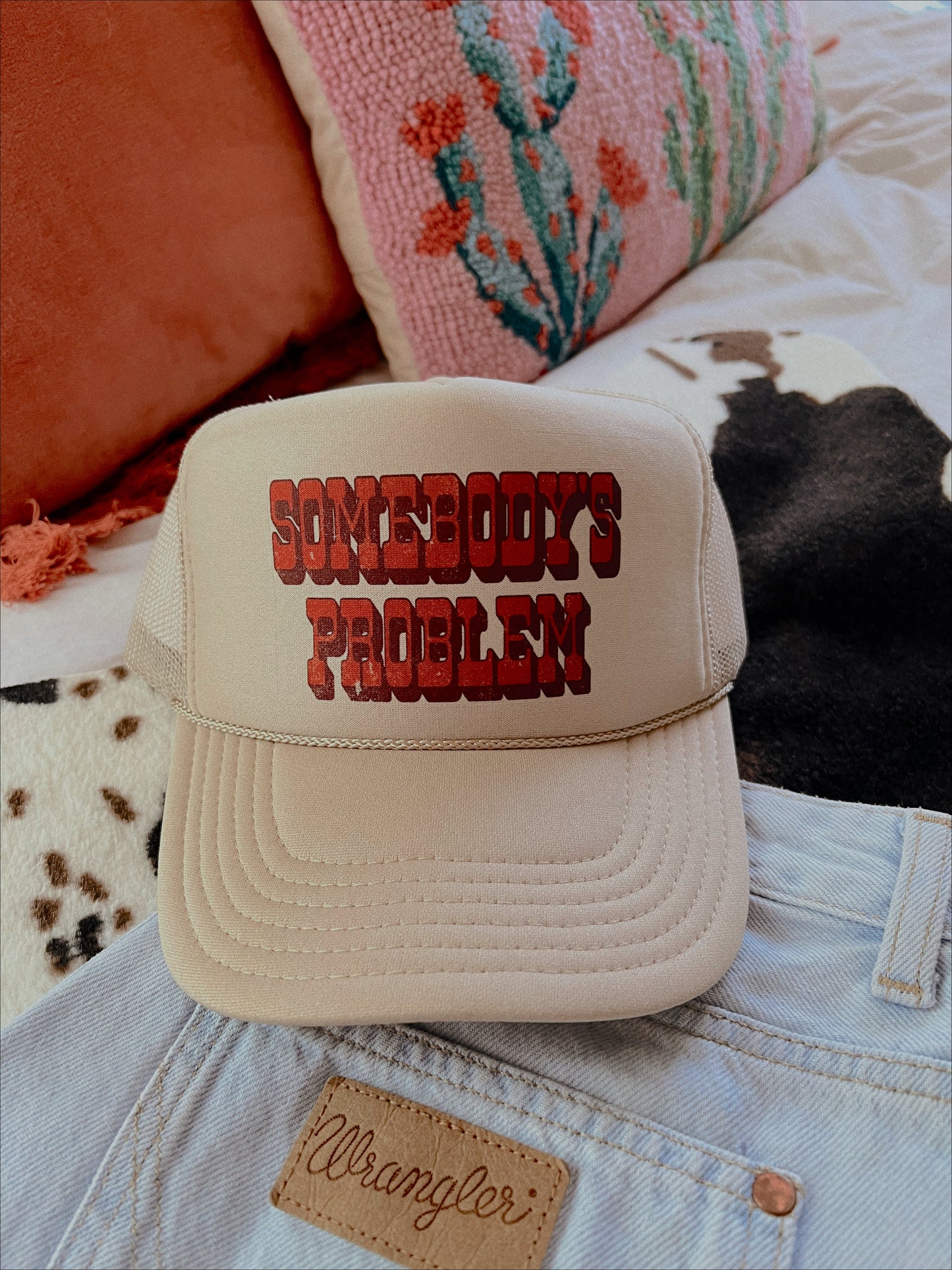 SOMEBODYS PROBLEM TRUCKER HAT